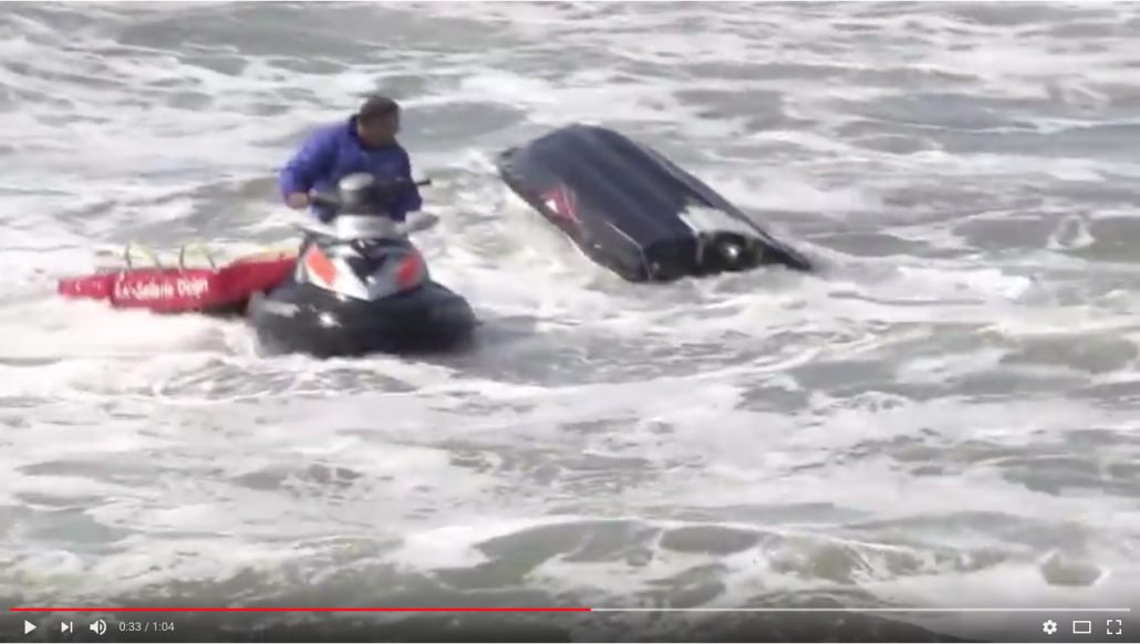 Jet Ski Flip Over In The Wave a few inches from the rocks